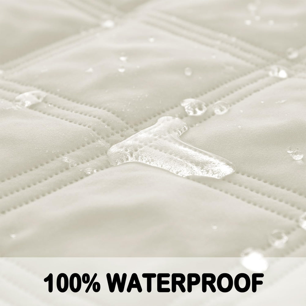 Fuguitex waterproof dog blanket pink-cream on couch guarding against spills and fur