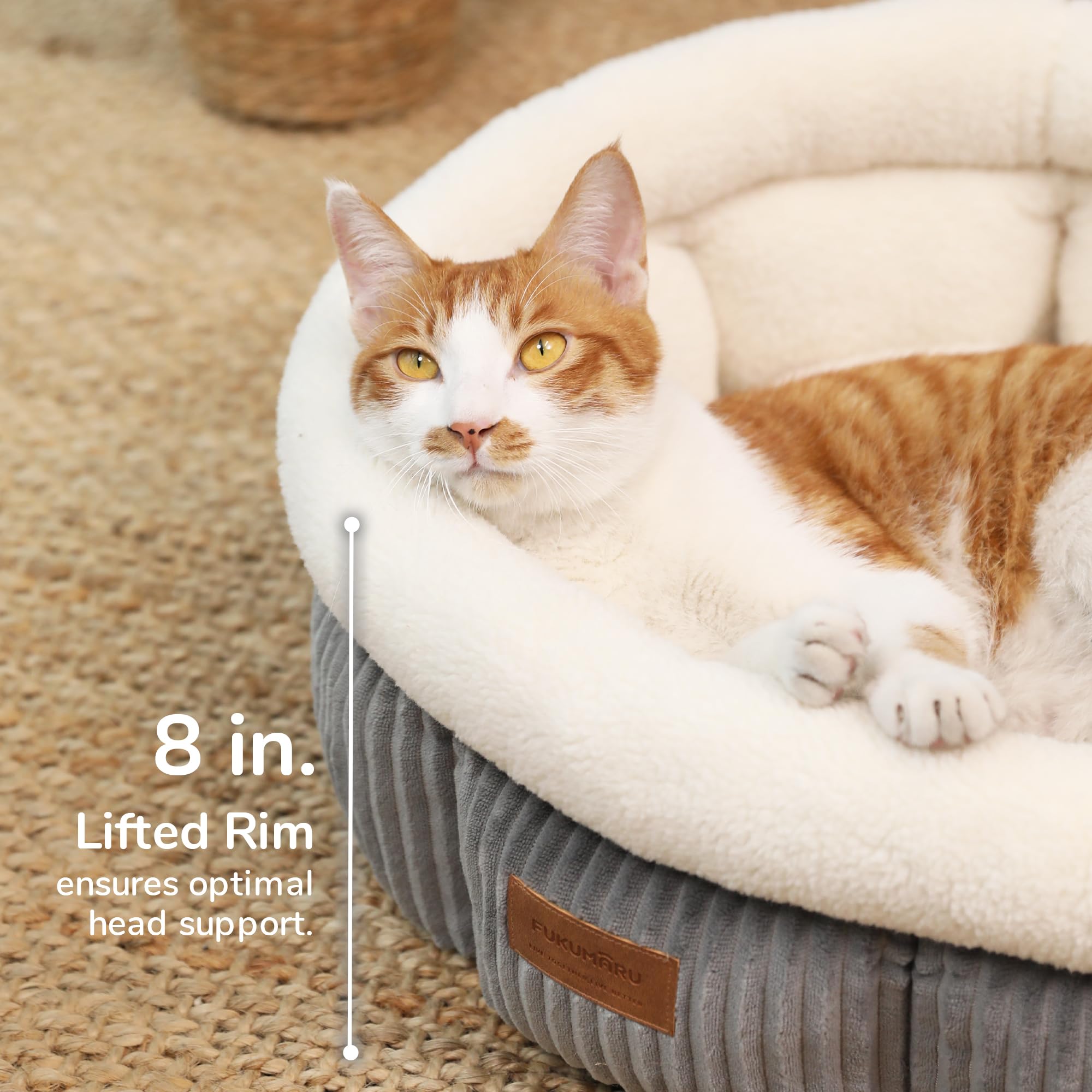 FUKUMARU cat bed anti-slip base on grey floor prevents sliding for uninterrupted naps.