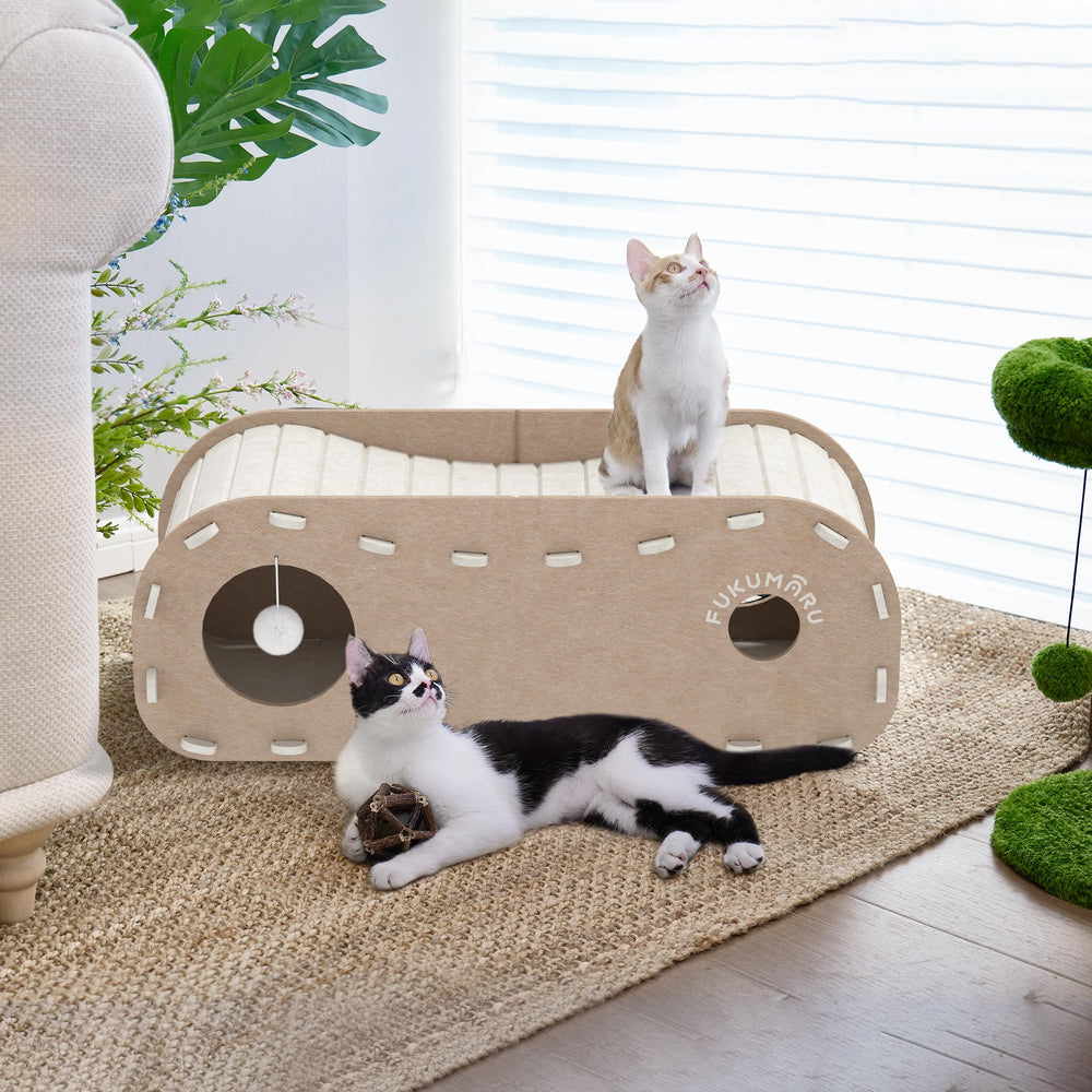 FUKUMARU cat bed entry holes illustrate easy access for exploration and play.
