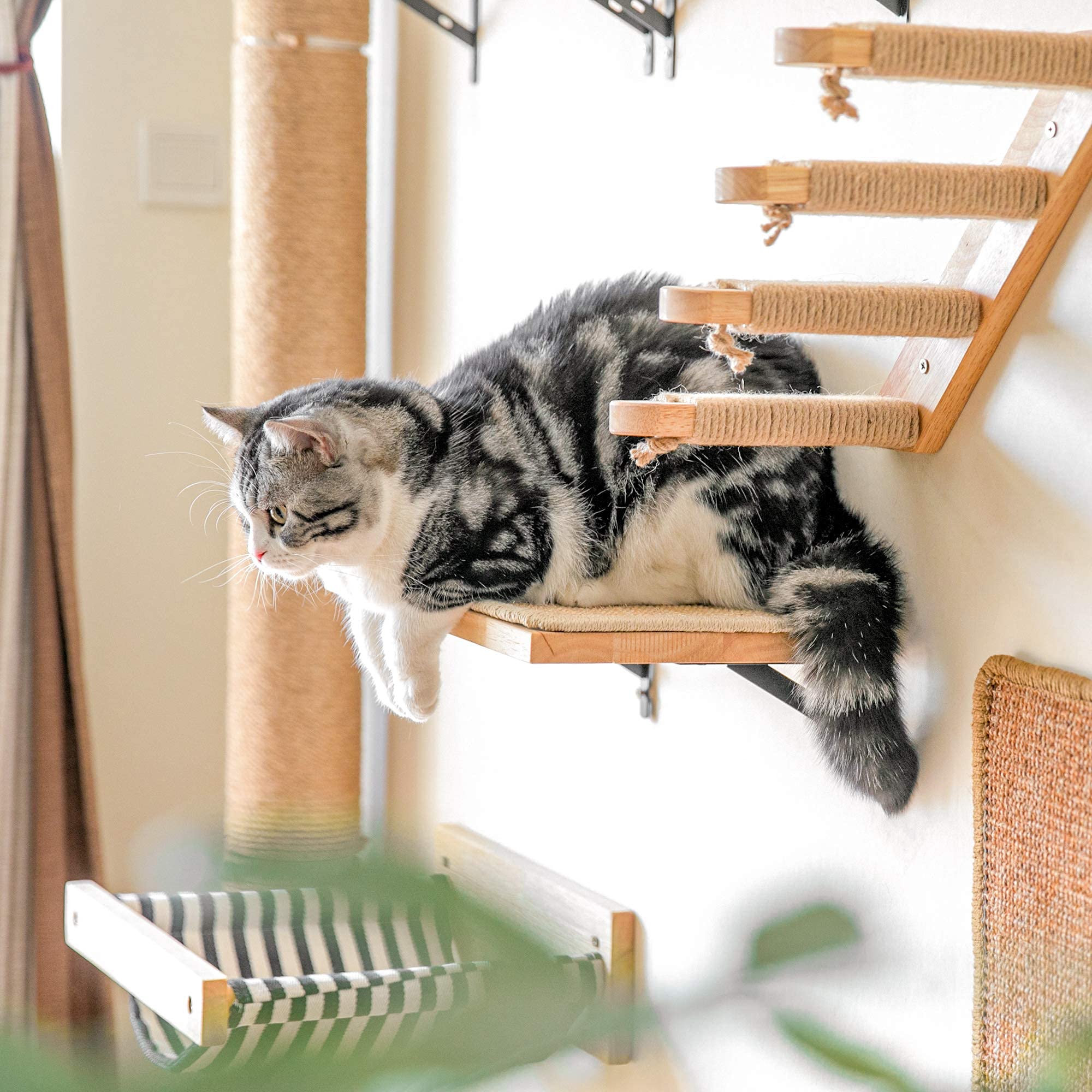 FUKUMARU sisal mat on shelf offers scratching and tactile engagement.