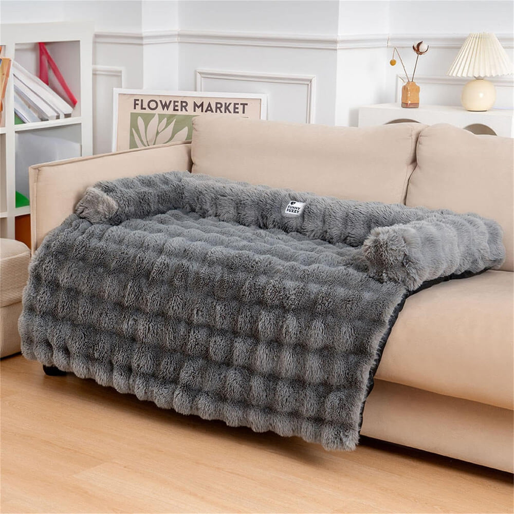 Funny Fuzzy pet-relaxation-scene shows a comfy couch bed in use by pets.