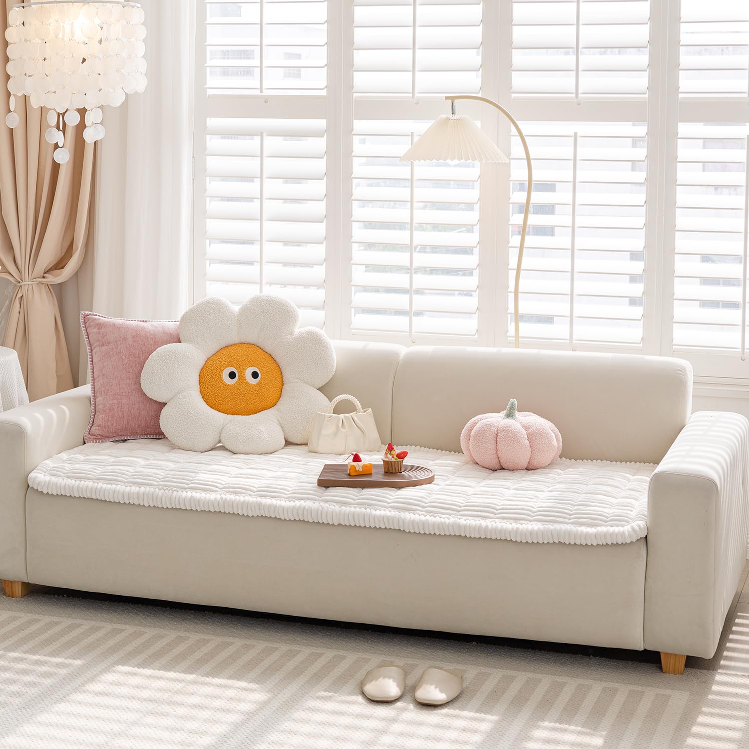 Funny Fuzzy white couch cover on a light sofa blends in discreetly.