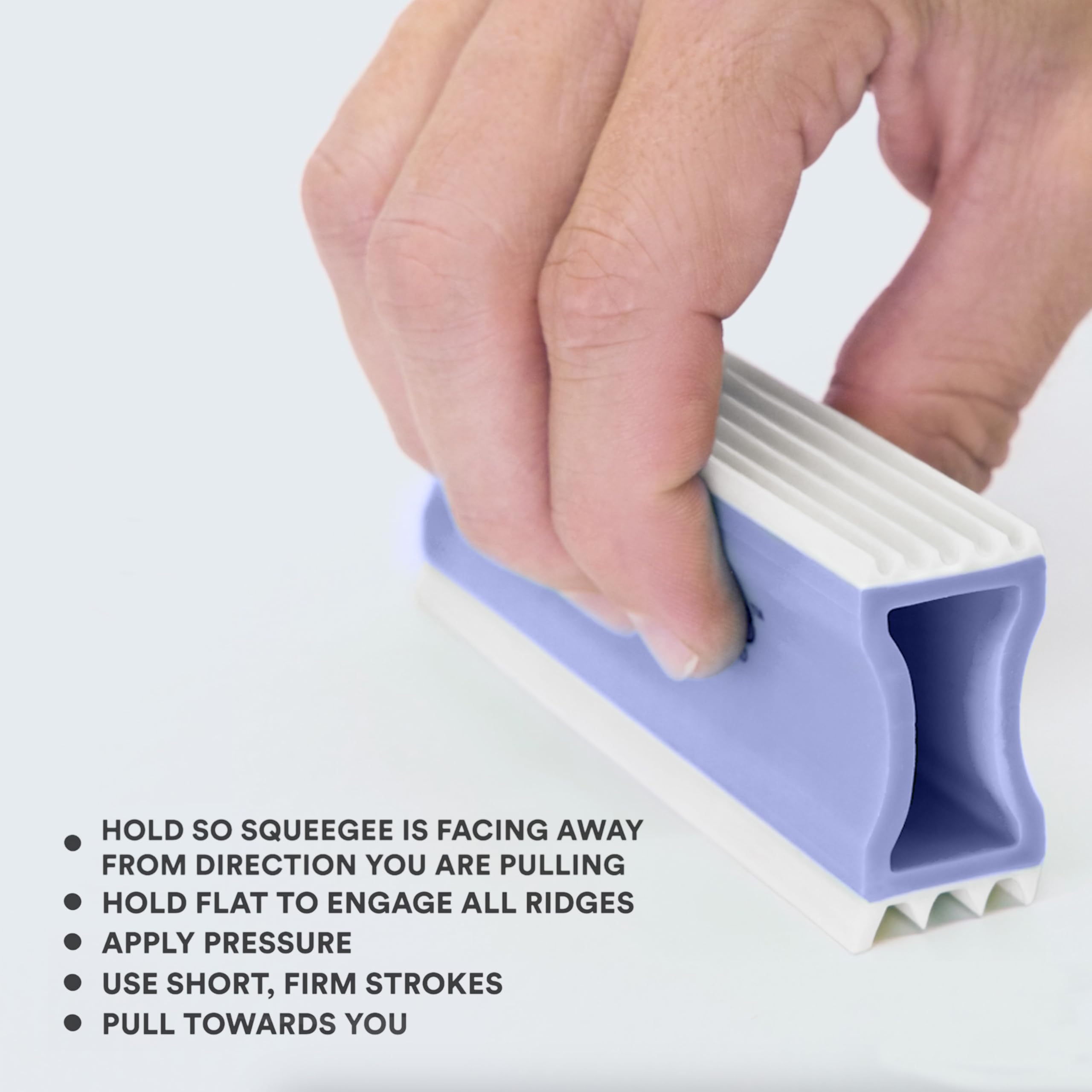 Neater Pet Brands FurDozer crevice tool reaches between couch cushions and car seats.