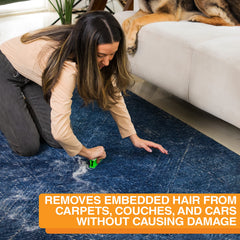FurDozer Green in-use on couch fabric removing pet hair.