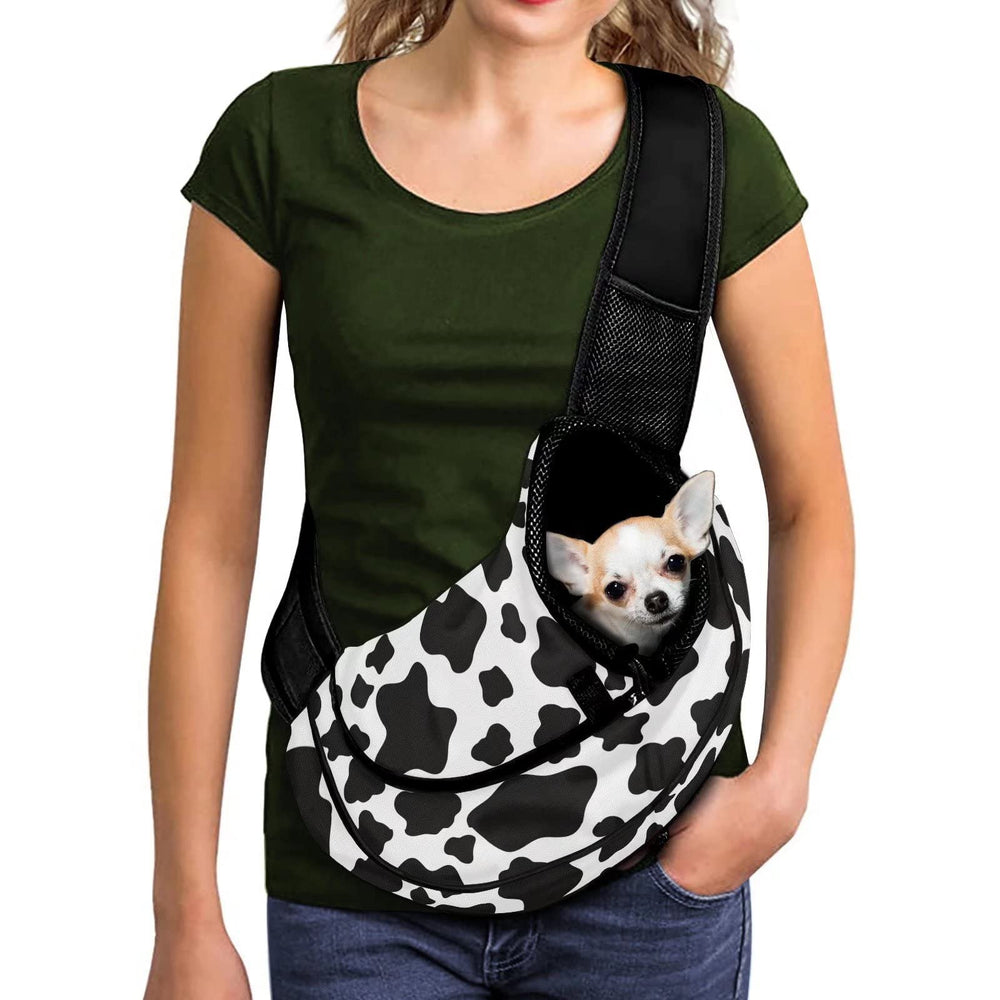 FUSURIRE cow print sling front view for hands-free outdoor travel with small pets