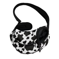 FUSURIRE cow print sling side view showing breathable mesh for comfort