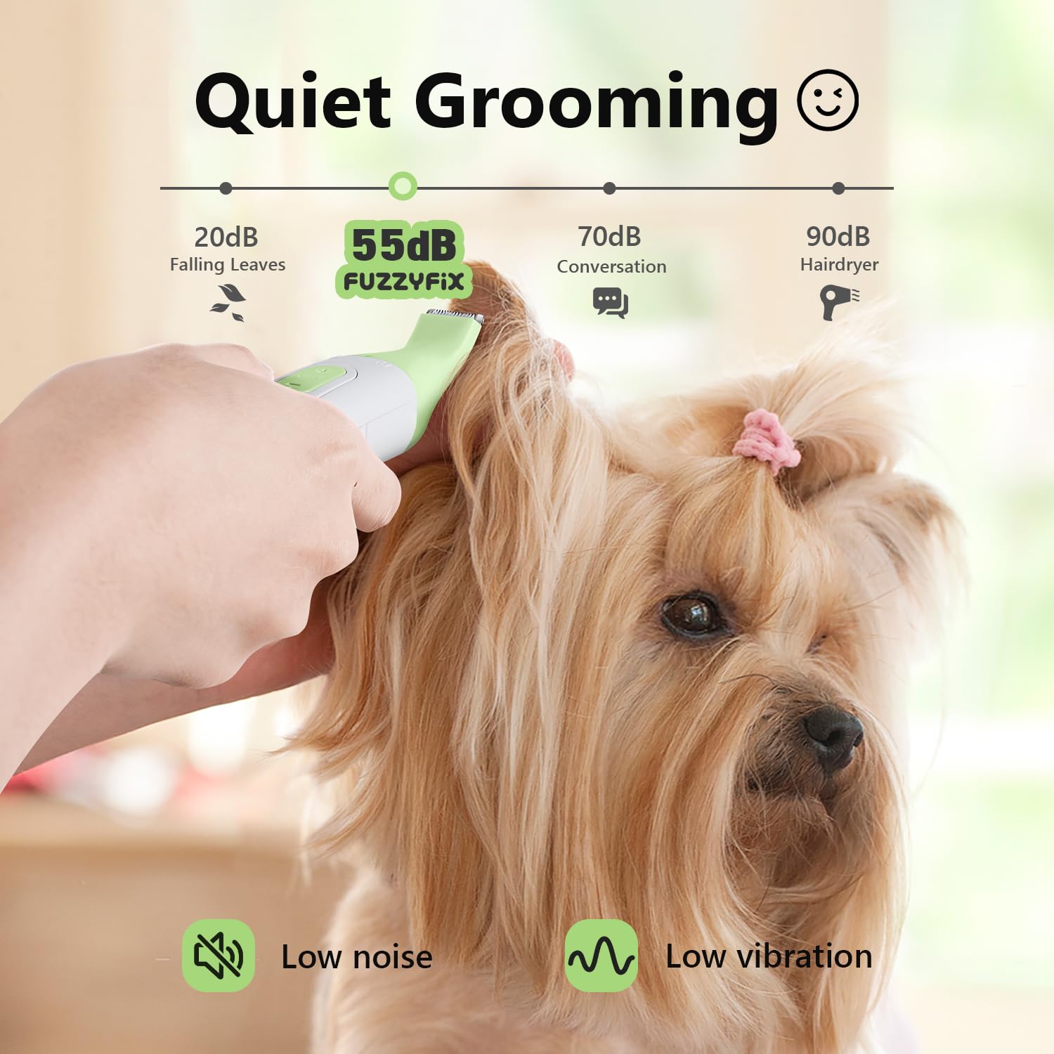 FuzzyFix cordless dog clippers in hand for quiet grooming.