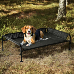 Gardner Pet elevated dog bed with three-sided guardrail offers secure outdoor naps.
