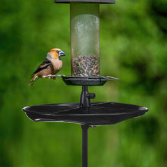 Geelin seed catcher tray installation on a 1-inch pole for stable outdoor feeding.