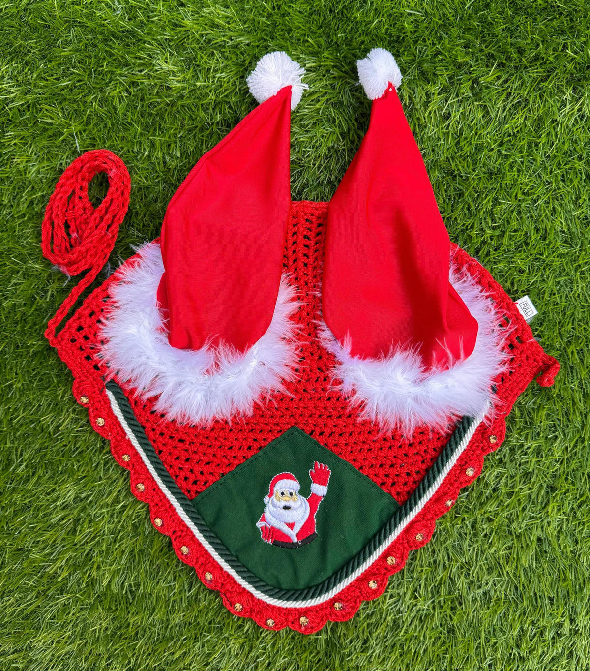 Generic Santa Claus horse ear bonnet embroidery close-up showing festive detail and snug fit.