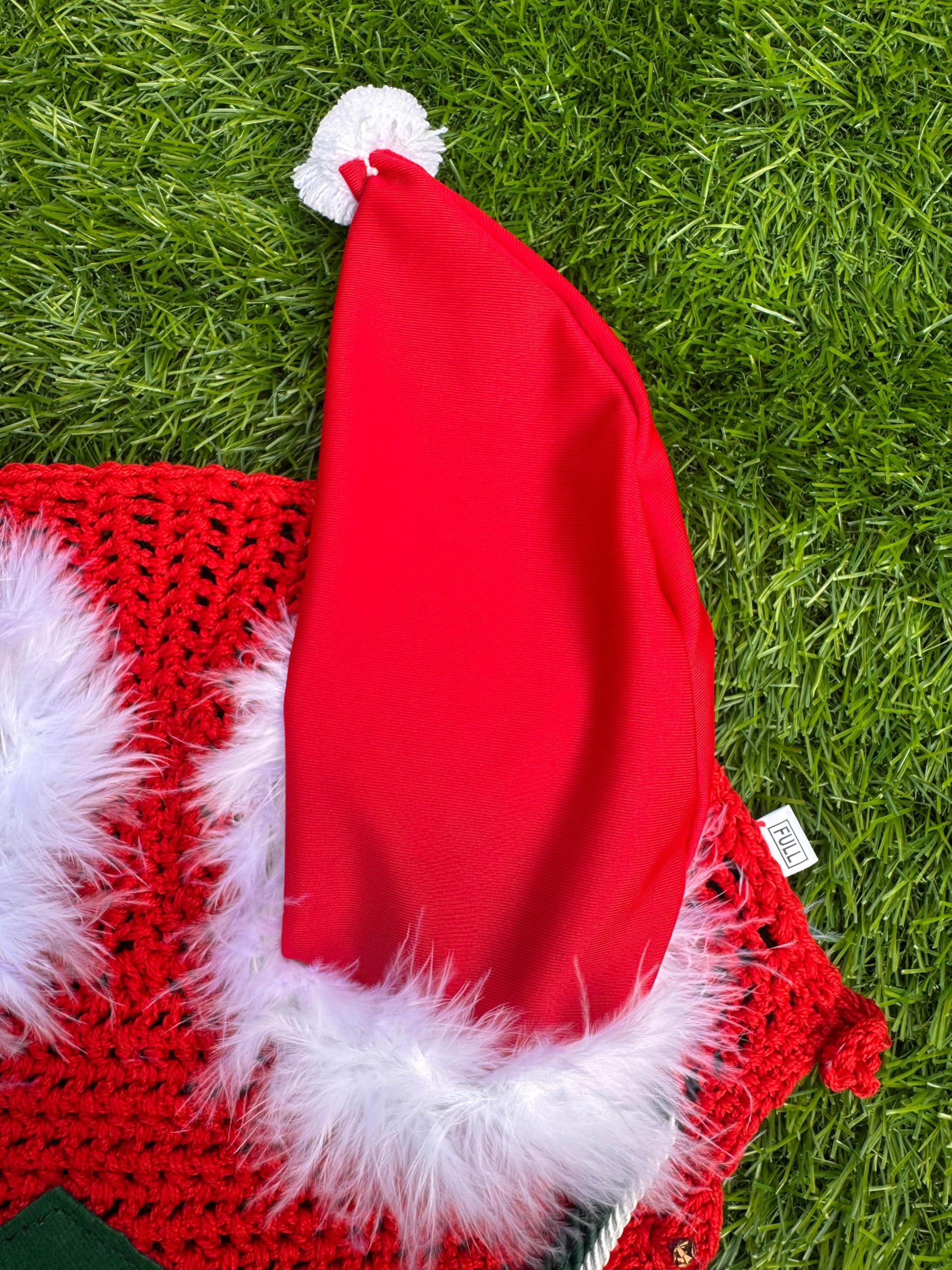 Generic Santa bonnet blocks noise while riding for calm schooling sessions.