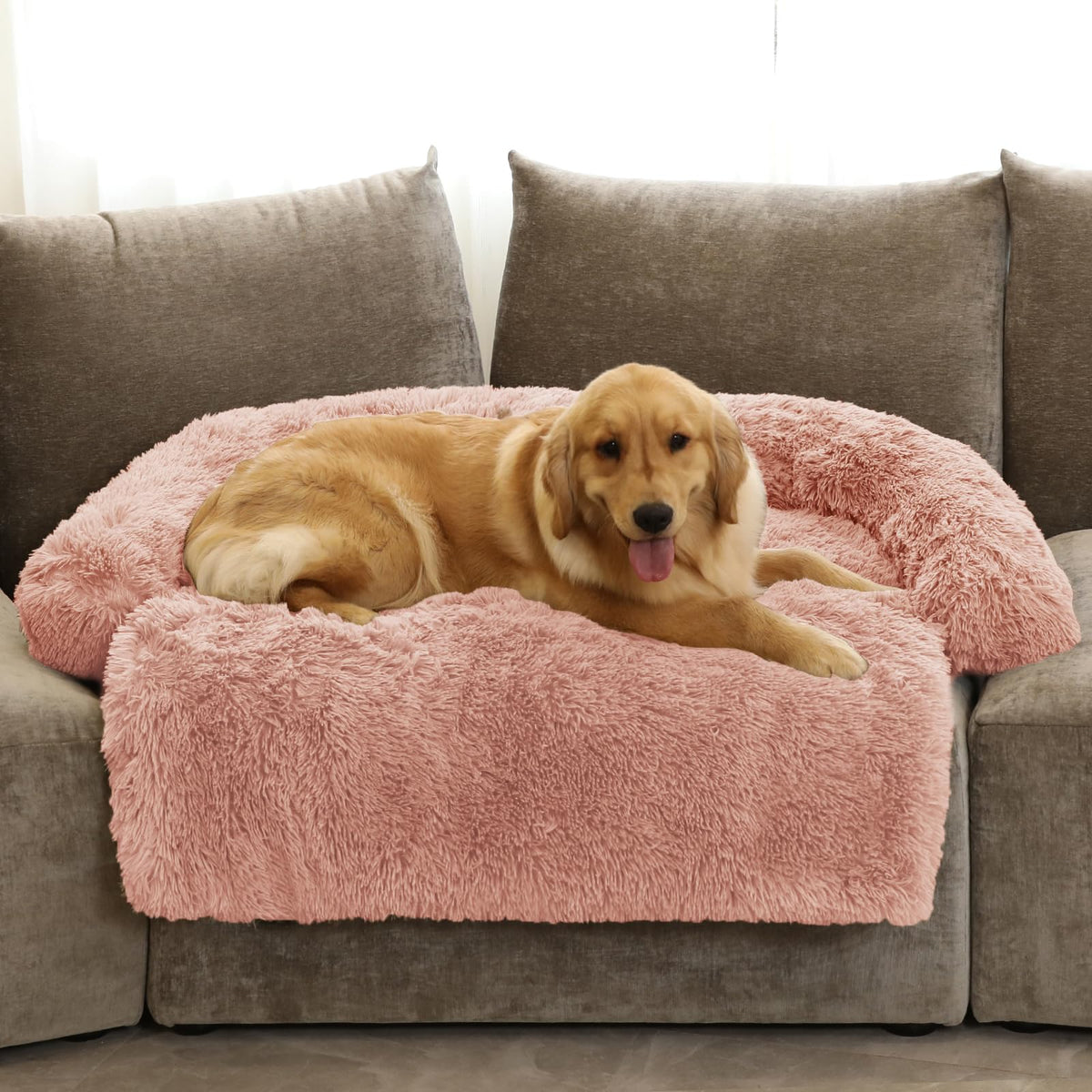 GGIB Calming Dog Bed curved design pink for restful sleep.