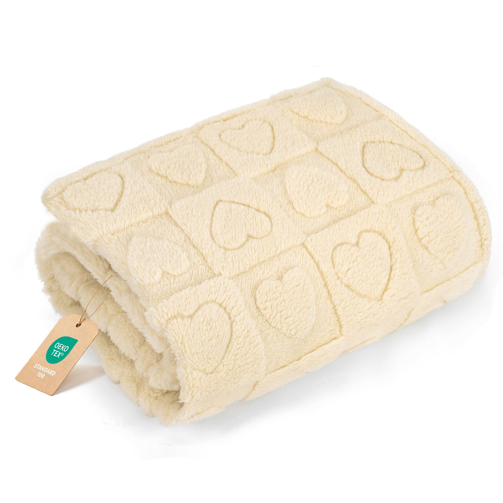 Gogobunny cozy fleece throw on a couch for relaxed lounging