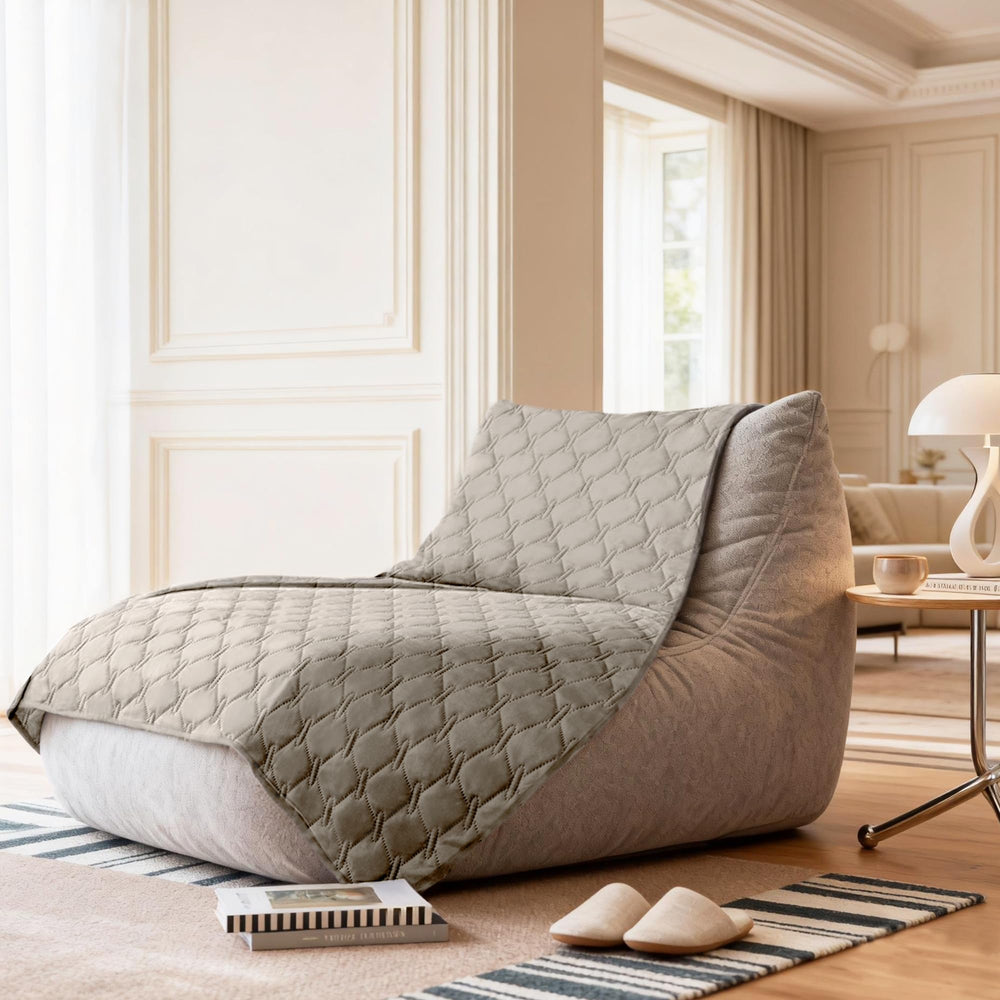 gogobunny blanket on sofa protecting furniture from paw scratches and saliva