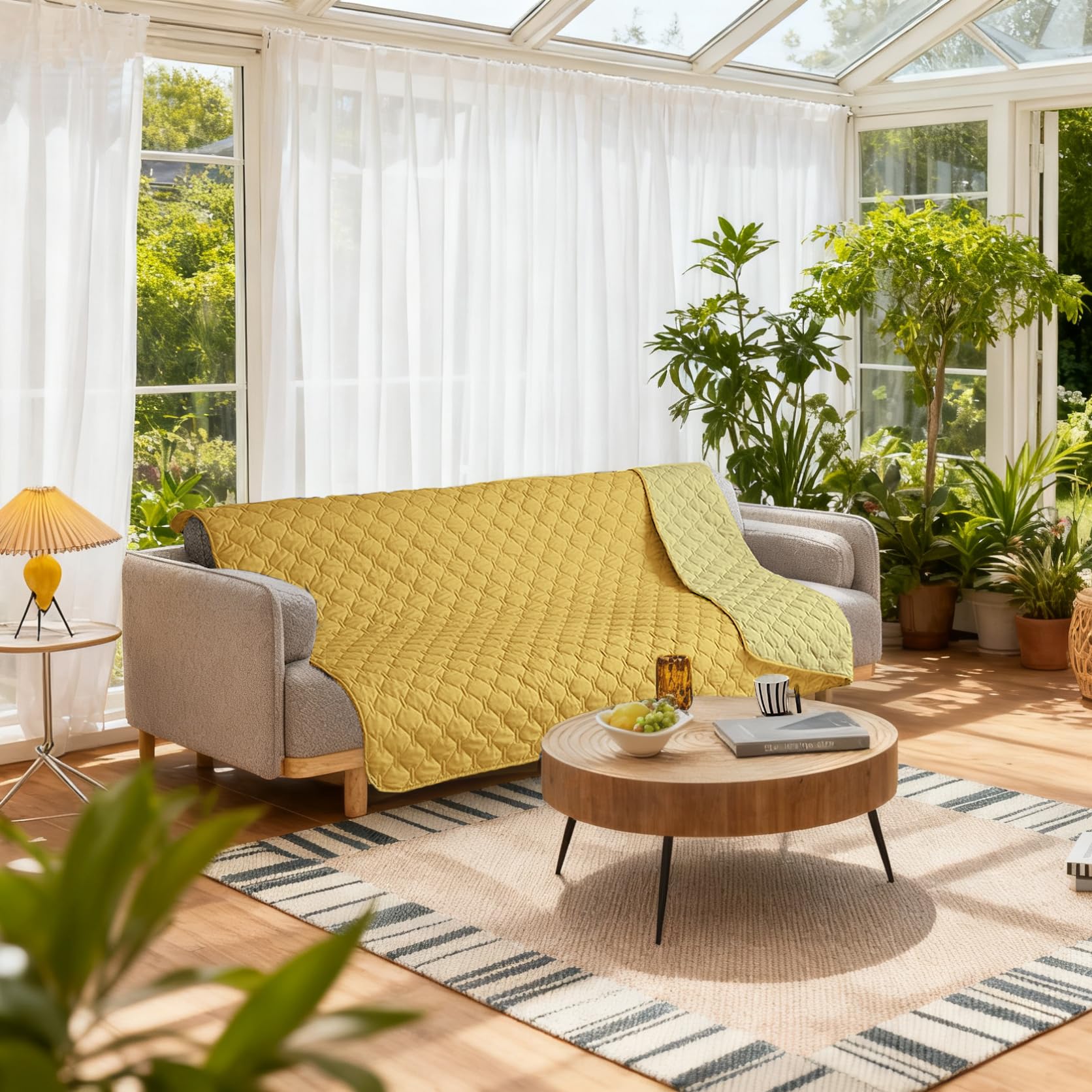 Gogobunny sofa protector on couch demonstrates durable fabric with easy care.