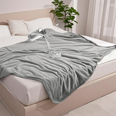 Gogobunny waterproof bed blanket in grey folded, offering bed protection from spills.