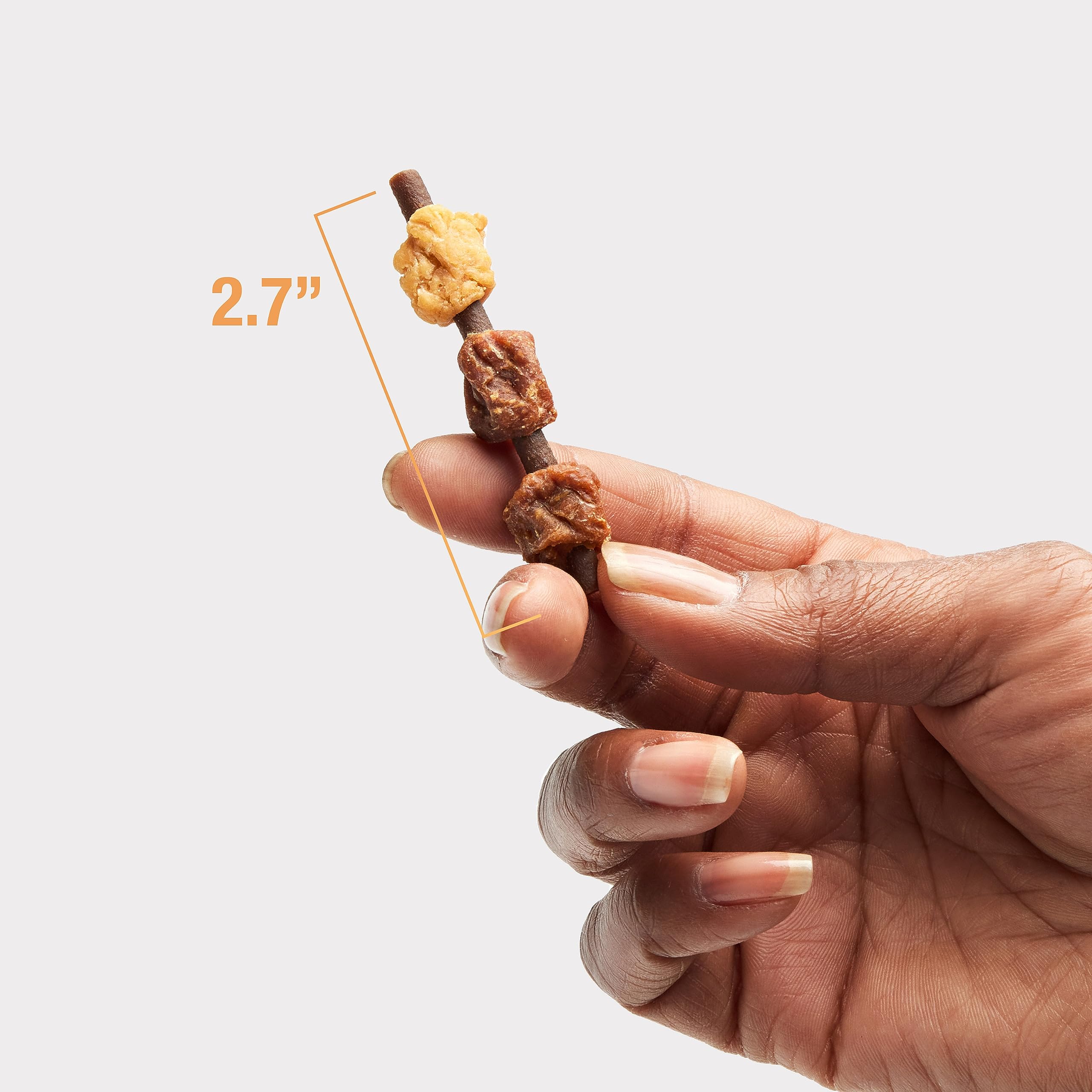 Texture-focused shot of Good'n'Fun Triple Flavor Kabobs being chewed