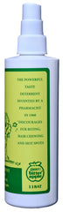 Grannick's Bitter Apple spray demonstrated on a dog's coat to discourage chewing.