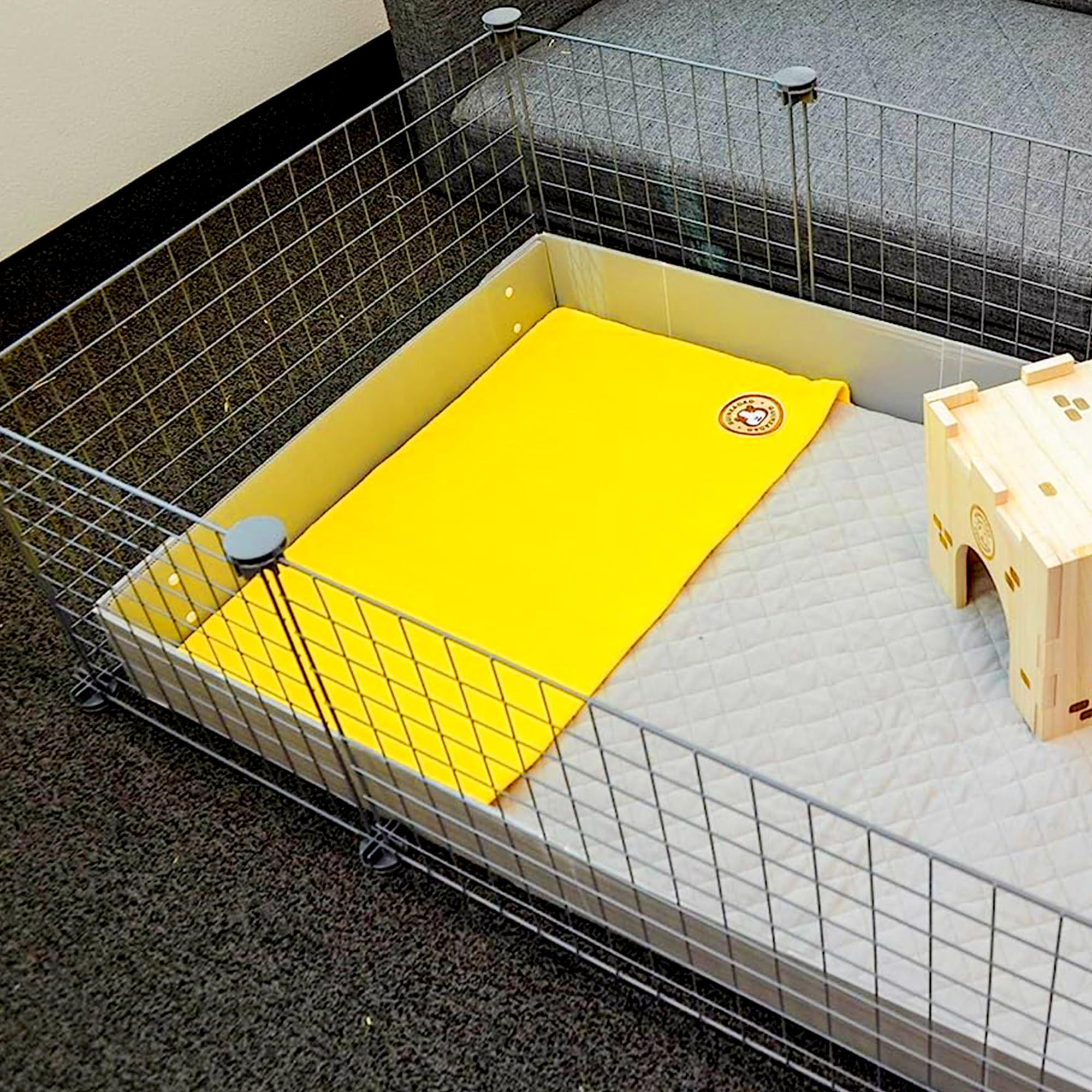 GuineaDad Original cage liner versatile for car rides and travel.