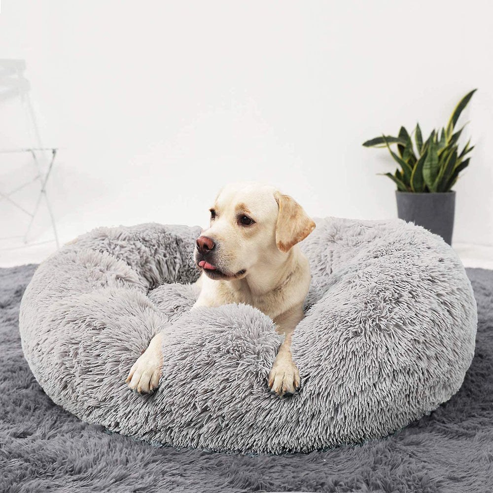 HACHIKITTY Calming Donut Cuddler bed washable label indicates easy care.