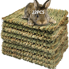 Hamiledyi grass mat inside cage offers chew-friendly bedding for small pets.