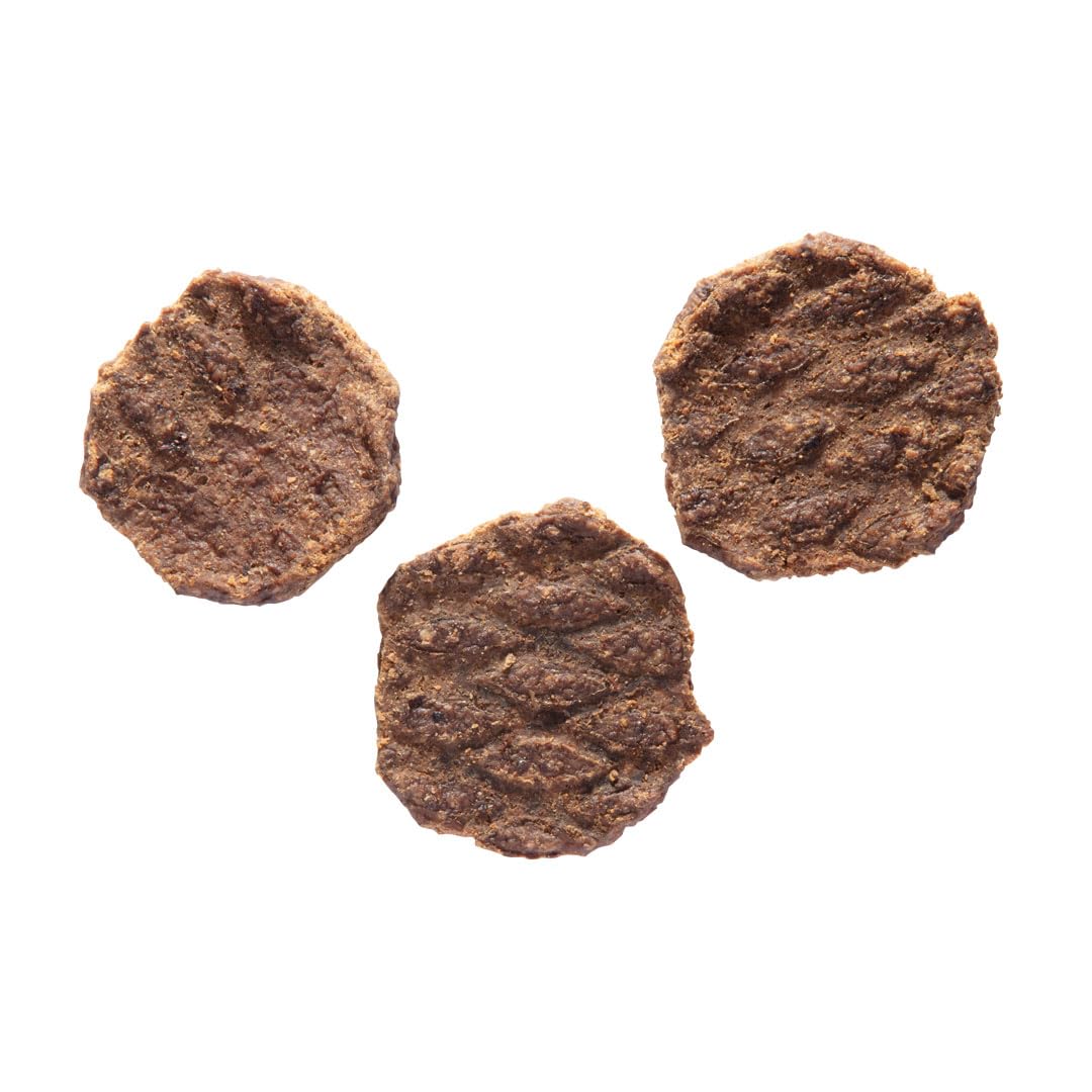 Happy Howie's Mini Doggy Burgers pack in bowl — gluten-free snack idea for all dogs.