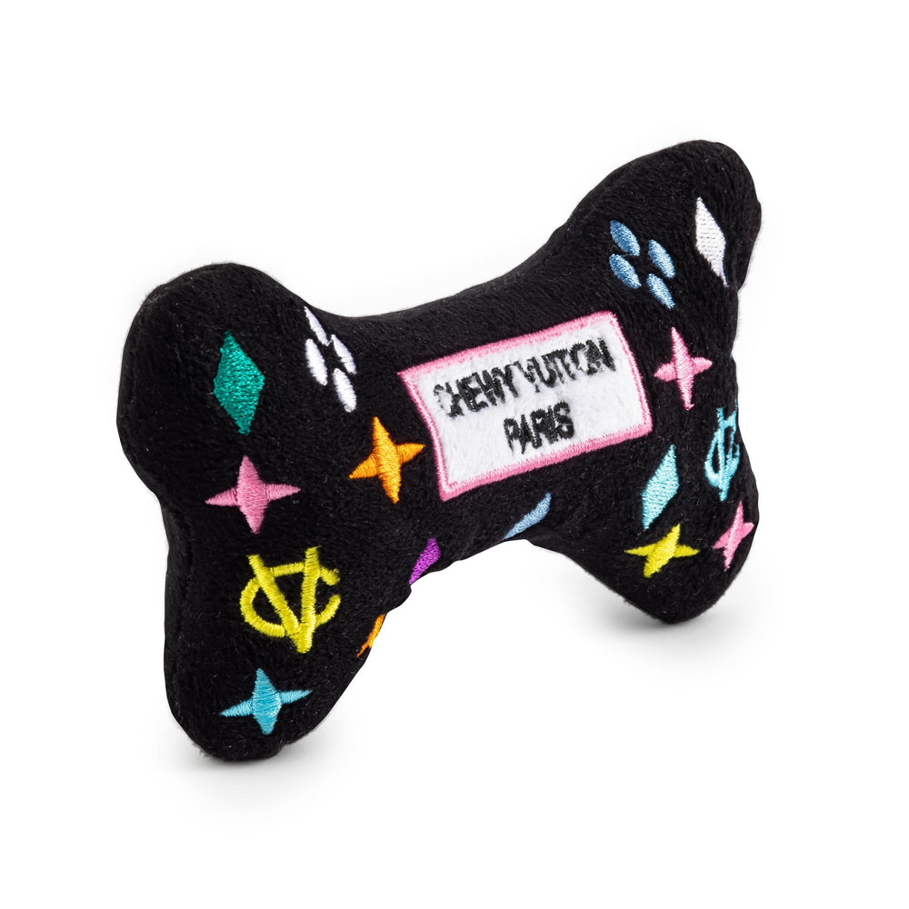 Haute Diggity Dog Chewy Vuiton Bone toy in black shows bold embroidery details.