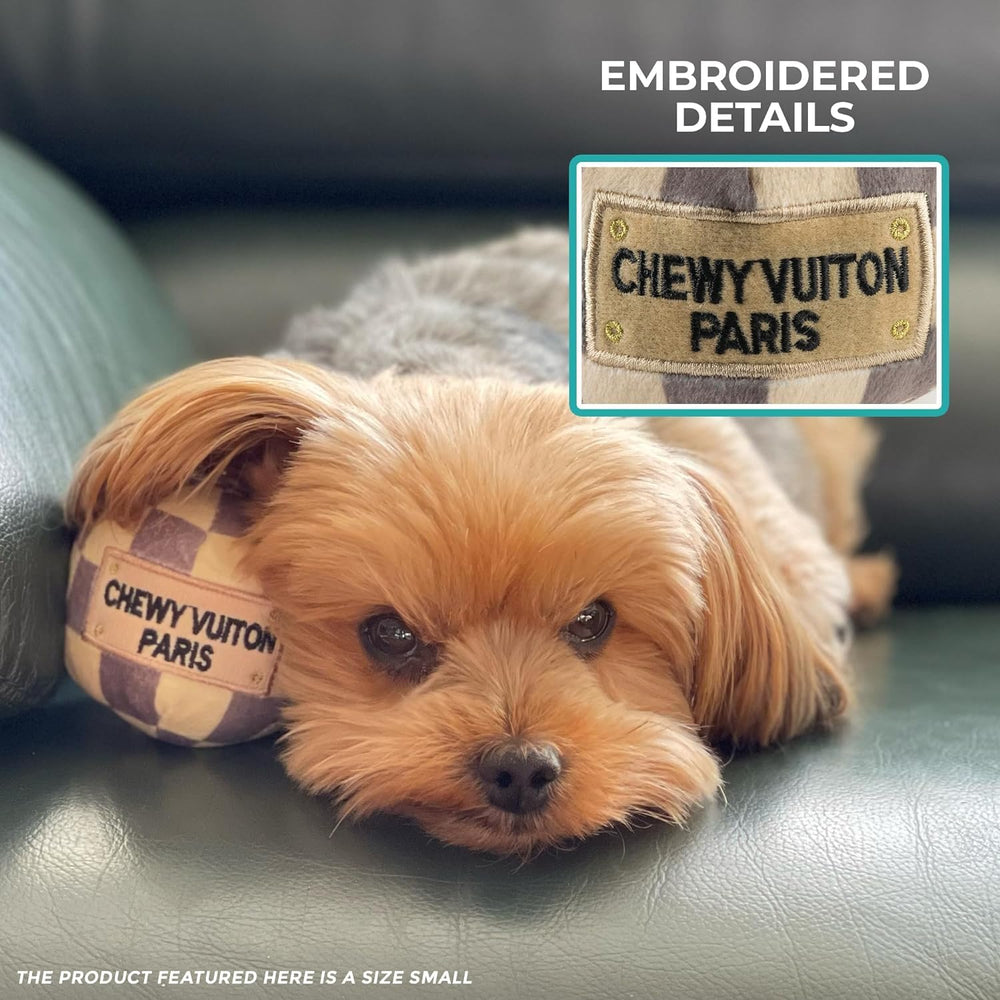 Haute Diggity Dog Checker Chewy Vuiton Ball dog-playing demonstrates interactive squeaker engagement.