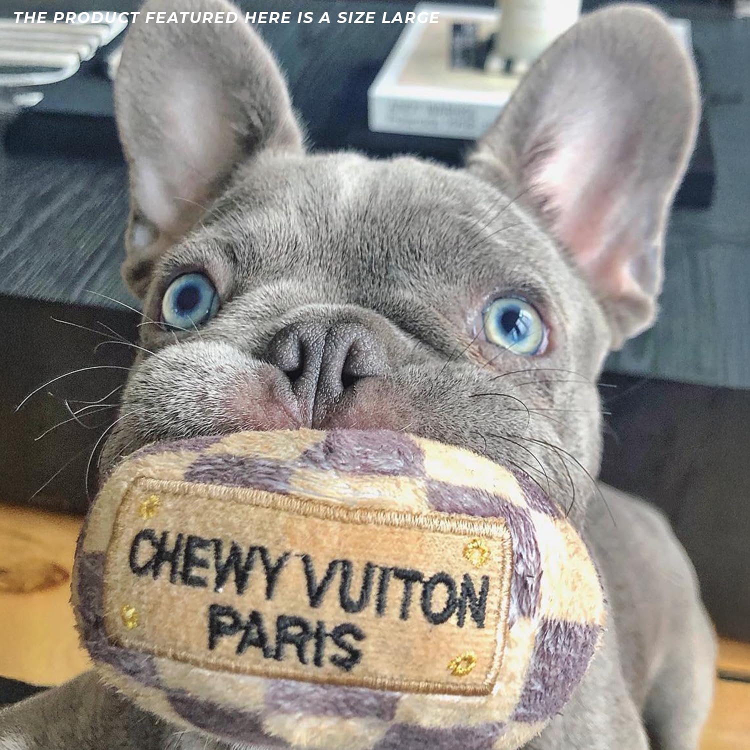Haute Diggity Dog Checker Chewy Vuiton Ball in use during tug sessions