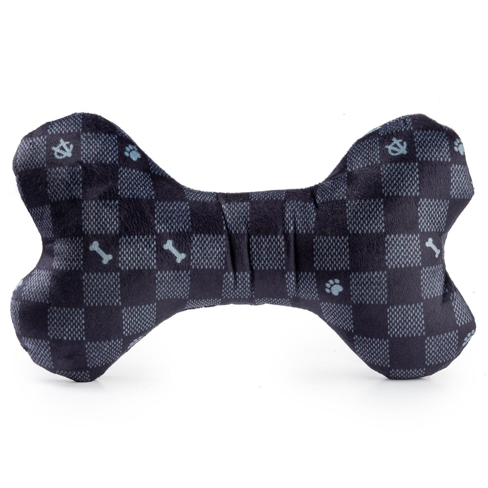 Haute Diggity Dog Checker Chewy Vuiton Bone dog playing with plush fashion toy.