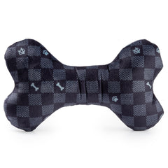Haute Diggity Dog Checker Chewy Vuiton Bone dog playing with plush fashion toy.