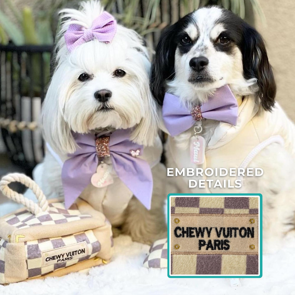 Embroidery details on Haute Diggity Dog Checker Chewy Vuiton trunk add elegant charm.