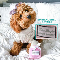 Miss Dogior pink plush toy with squeaker promotes interactive play.