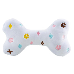 Haute Diggity Dog White Chewy Vuiton Bone inner-squeaker keeps dogs engaged during fetch.