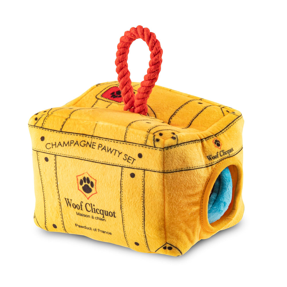 Haute Diggity Dog Woof Clicquot Pawty plushes close-up highlighting playful designs and embroidery.
