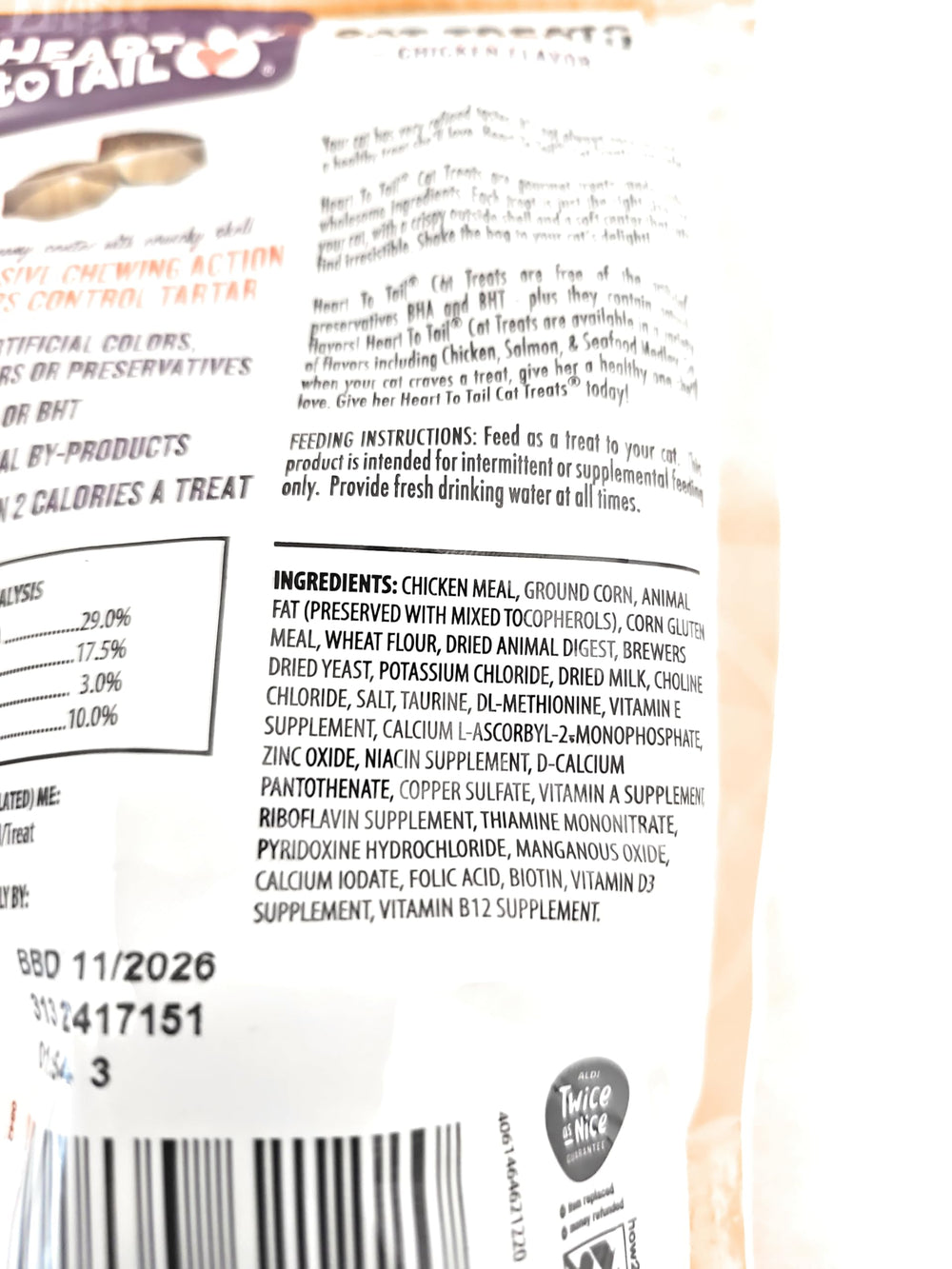 Heart To Tail chicken flavored cat treats shelf-ready packaging for easy pantry access.