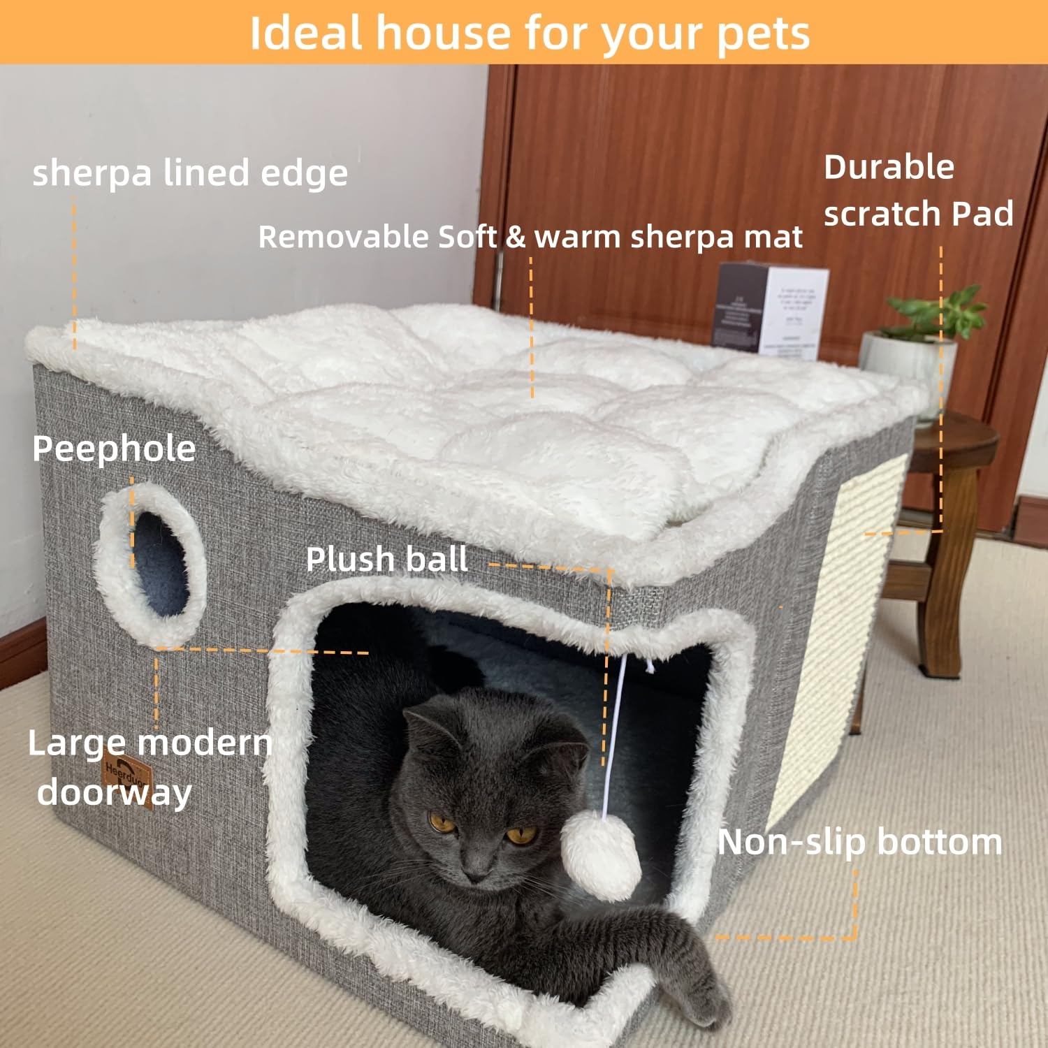 Heerduos cat condo top open space for play and rest.