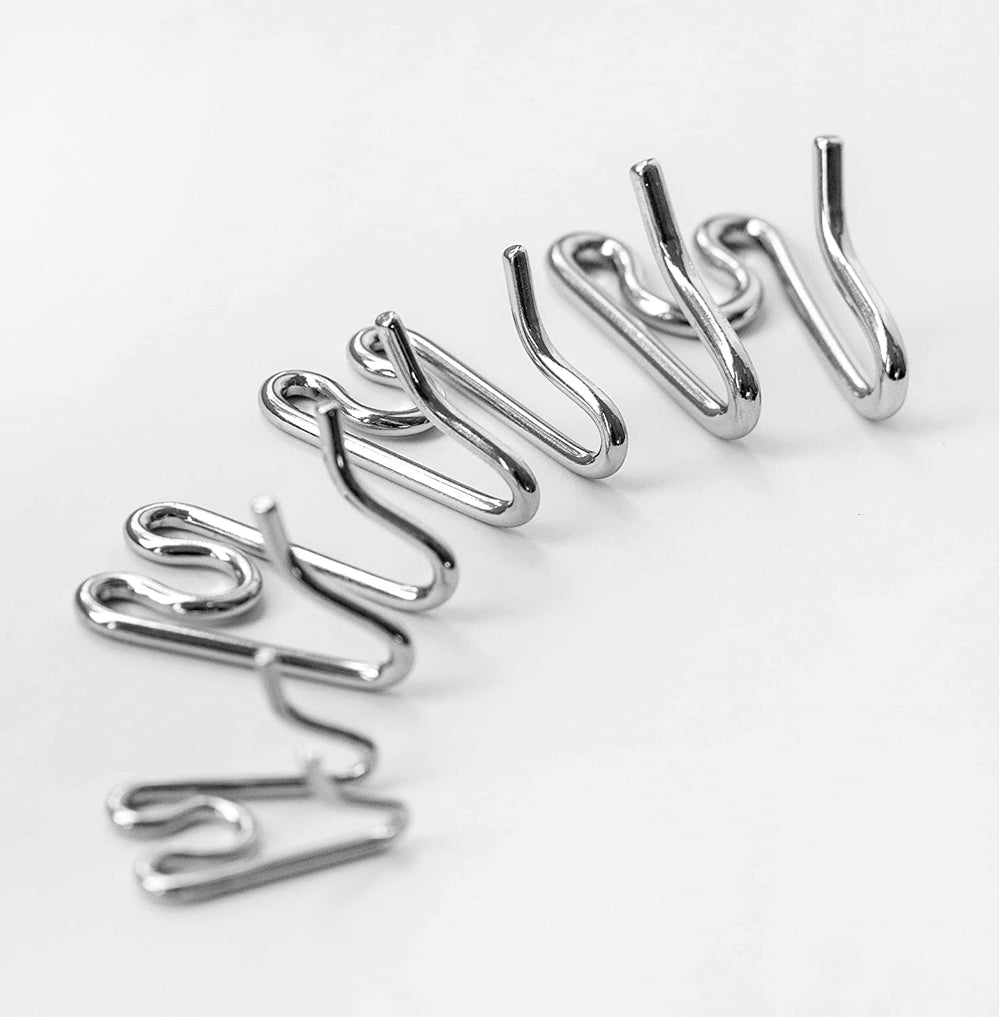 Herm Sprenger Ultra-Plus chrome prong collar closeup highlighting prongs and steel