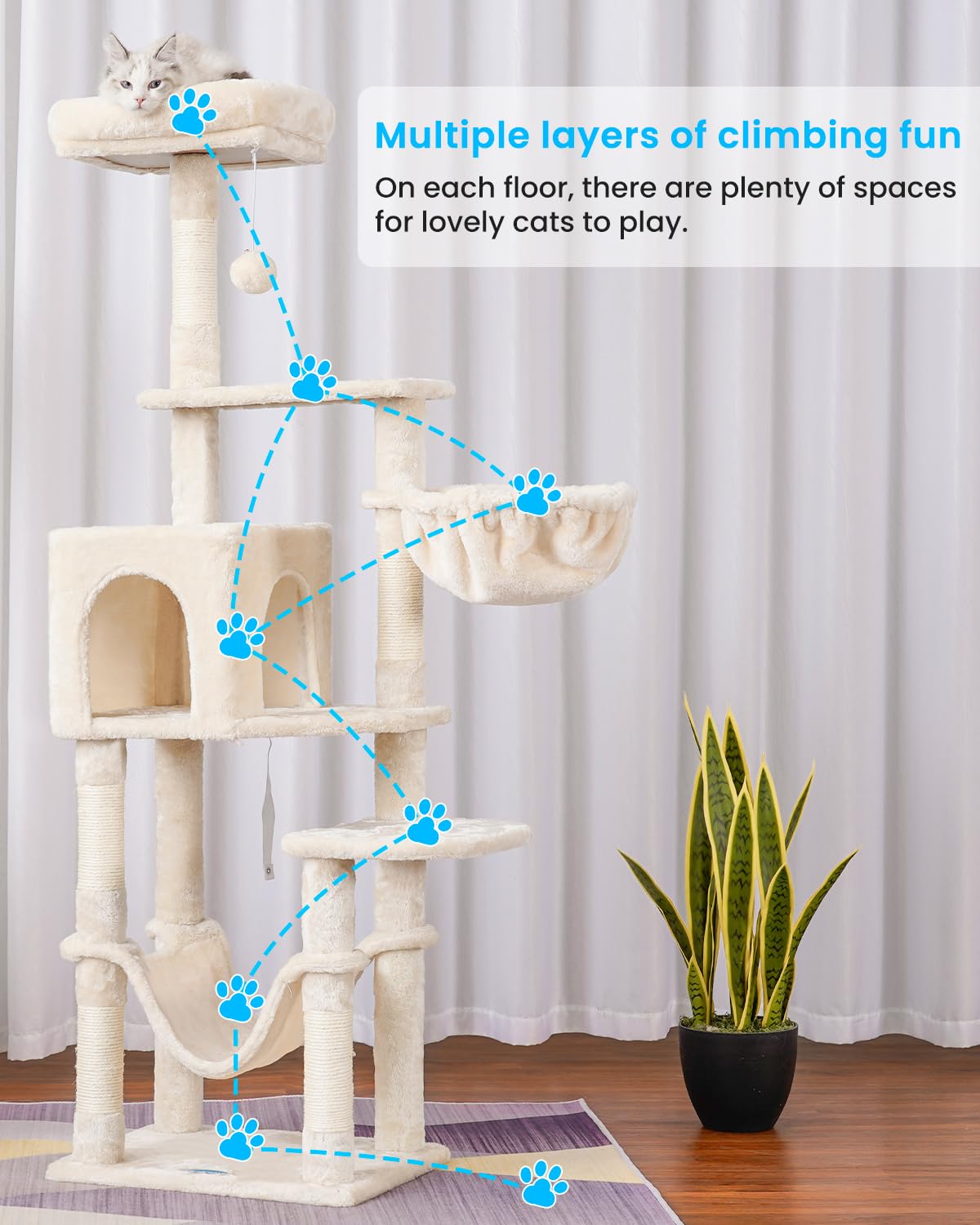 Hey-brother cat tree beige pompoms provide playful accents.