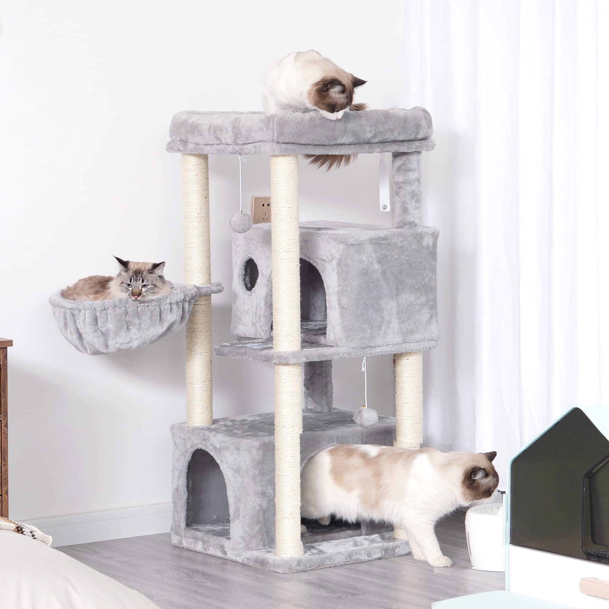 Hey-brother cat tree fits neatly in a room corner.