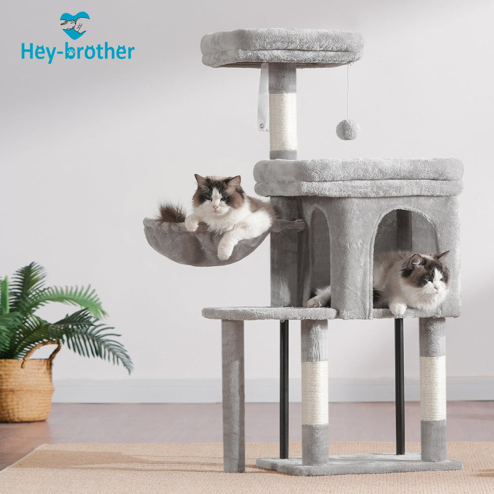 Hey-brother Cat Tree Tower in living room fits compact spaces neatly.