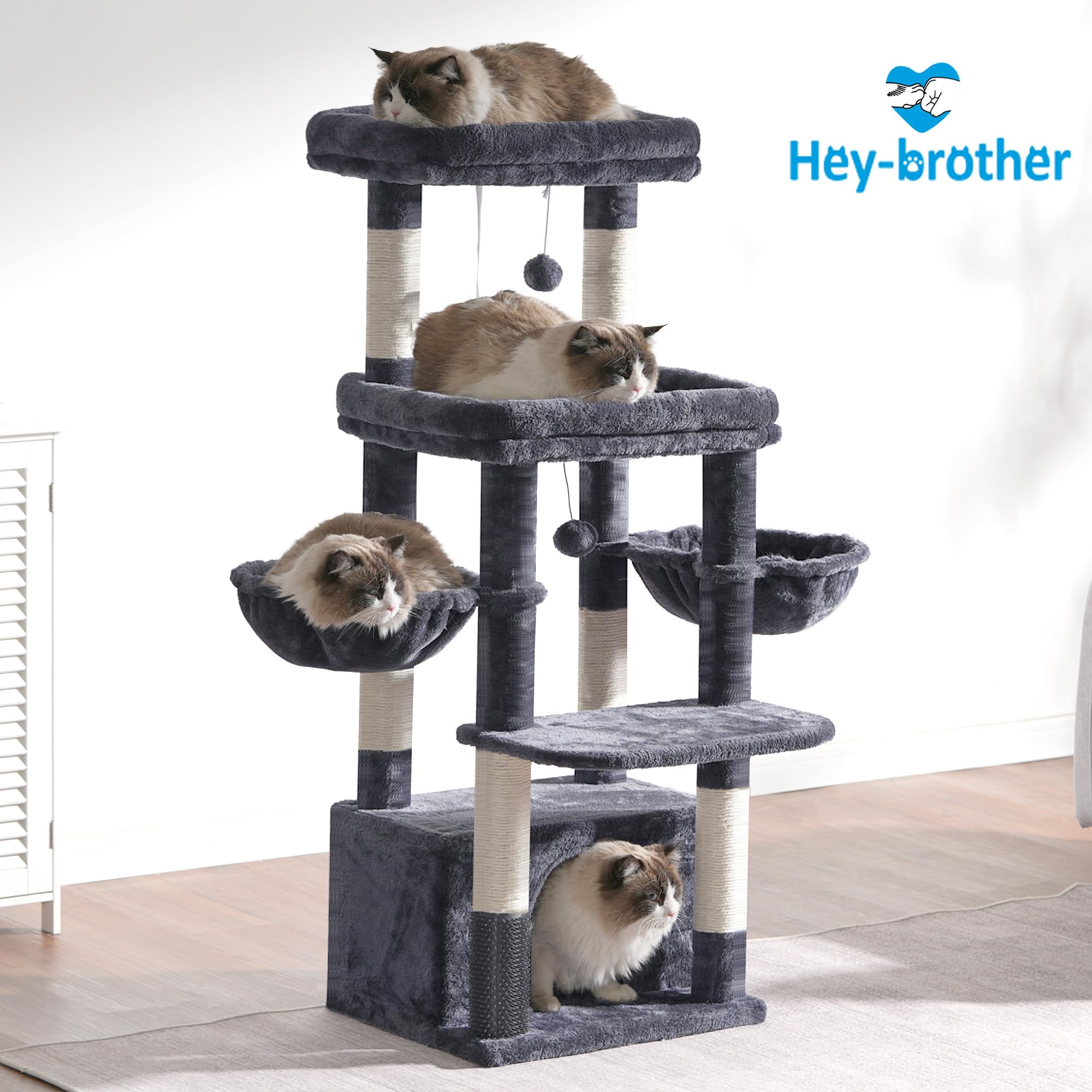 Hey-brother cat tree tower stable base prevents wobble in multi-cat use.
