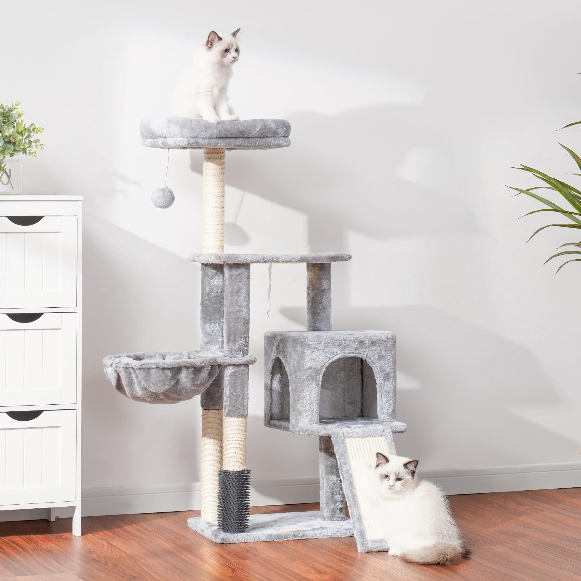 Heybly cat tower sturdy base supports two average-sized cats.