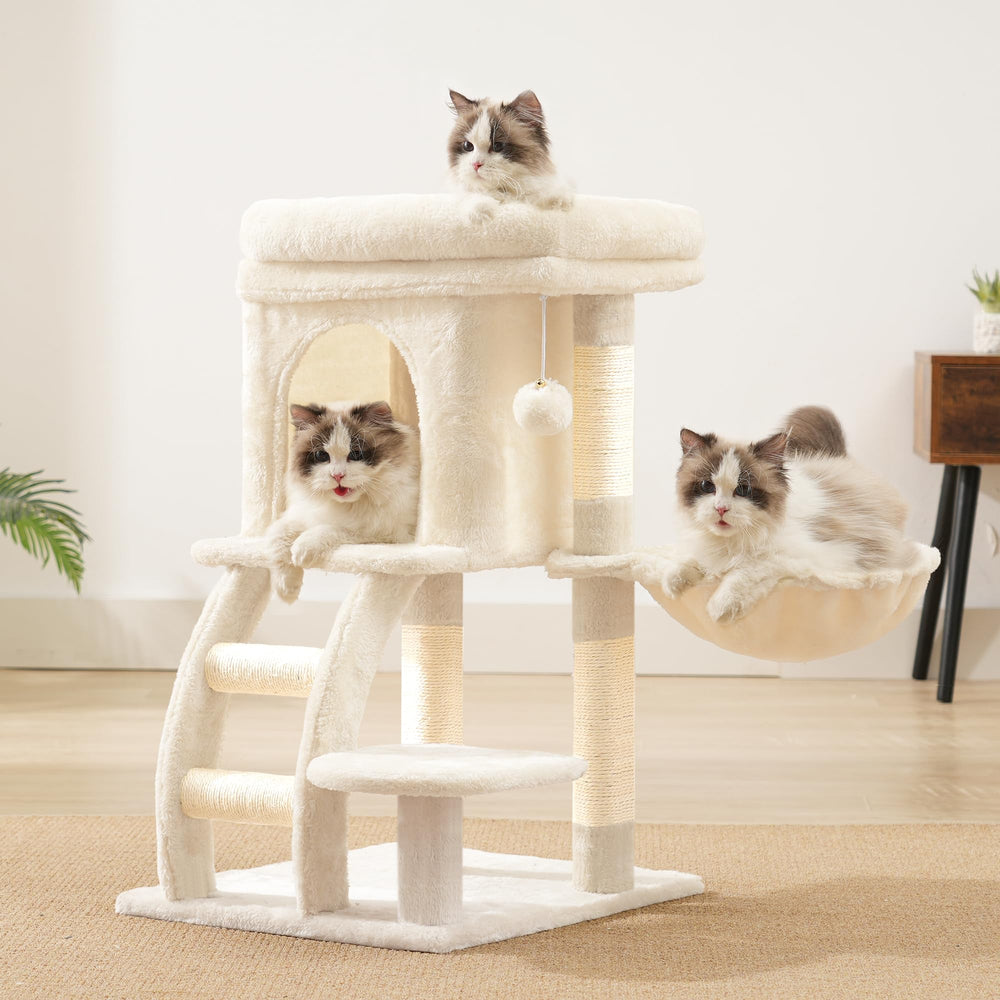 Heybly cat tree tower in-room view demonstrates compact footprint for apartment living.