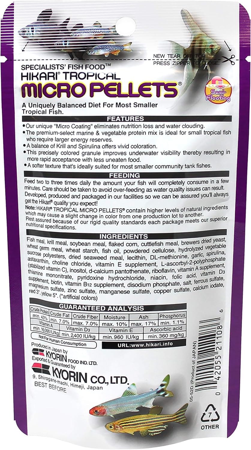 Hikari Alimento para peces tropicales, pellets micro, primer plano de nutrición.