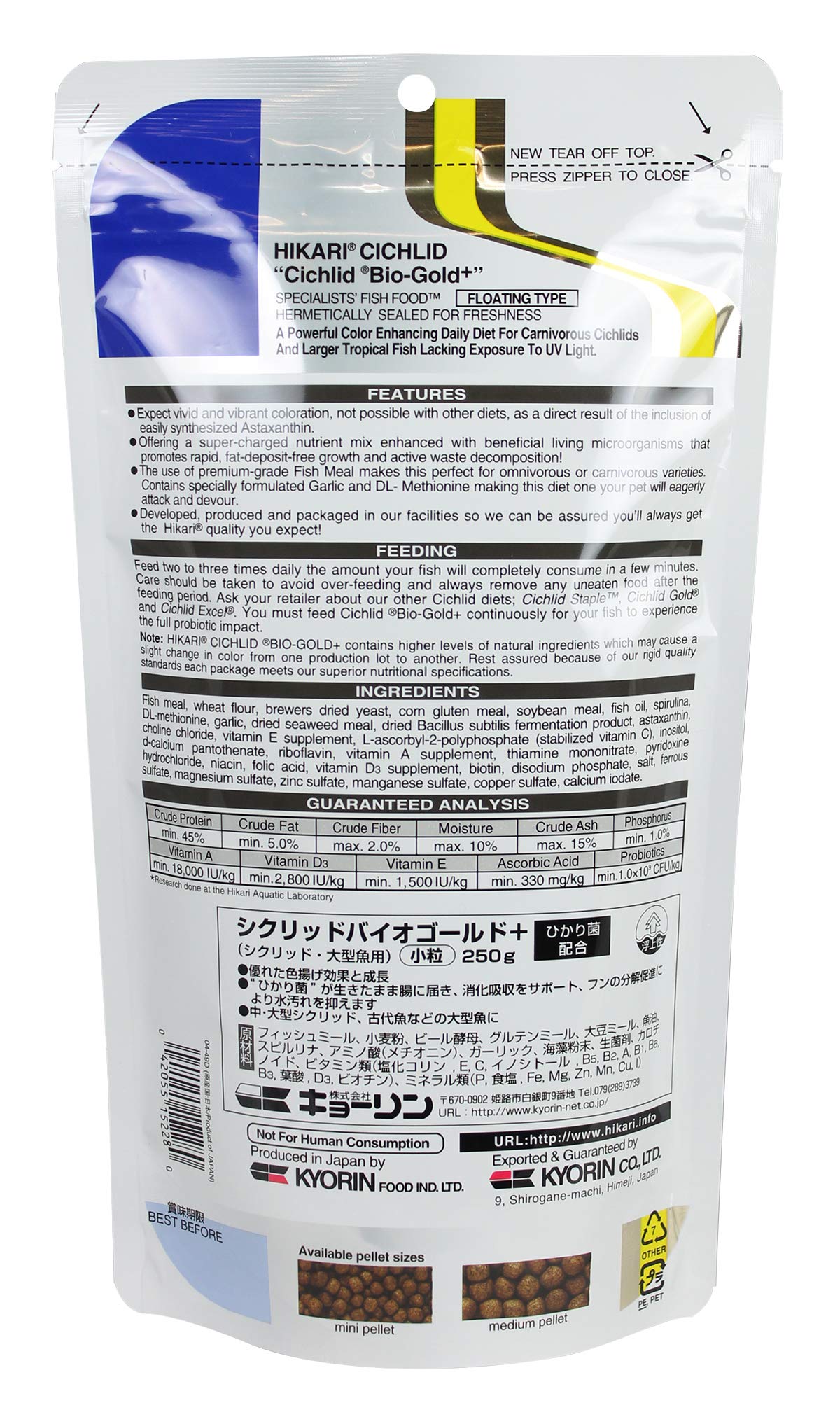 Hikari Bio-Gold pellets closeup in hand, medium-size for balanced feeding.