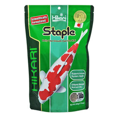 Hikari staple floating pellets for pond fish, water stays clear while immune support may occur.