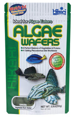 Hikari tropical algae wafer packaging shows pleco-friendly diet option.