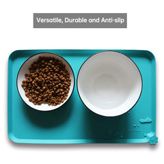 Hoki Found teal non-slip mat with raised edge prevents spill onto clean floors.