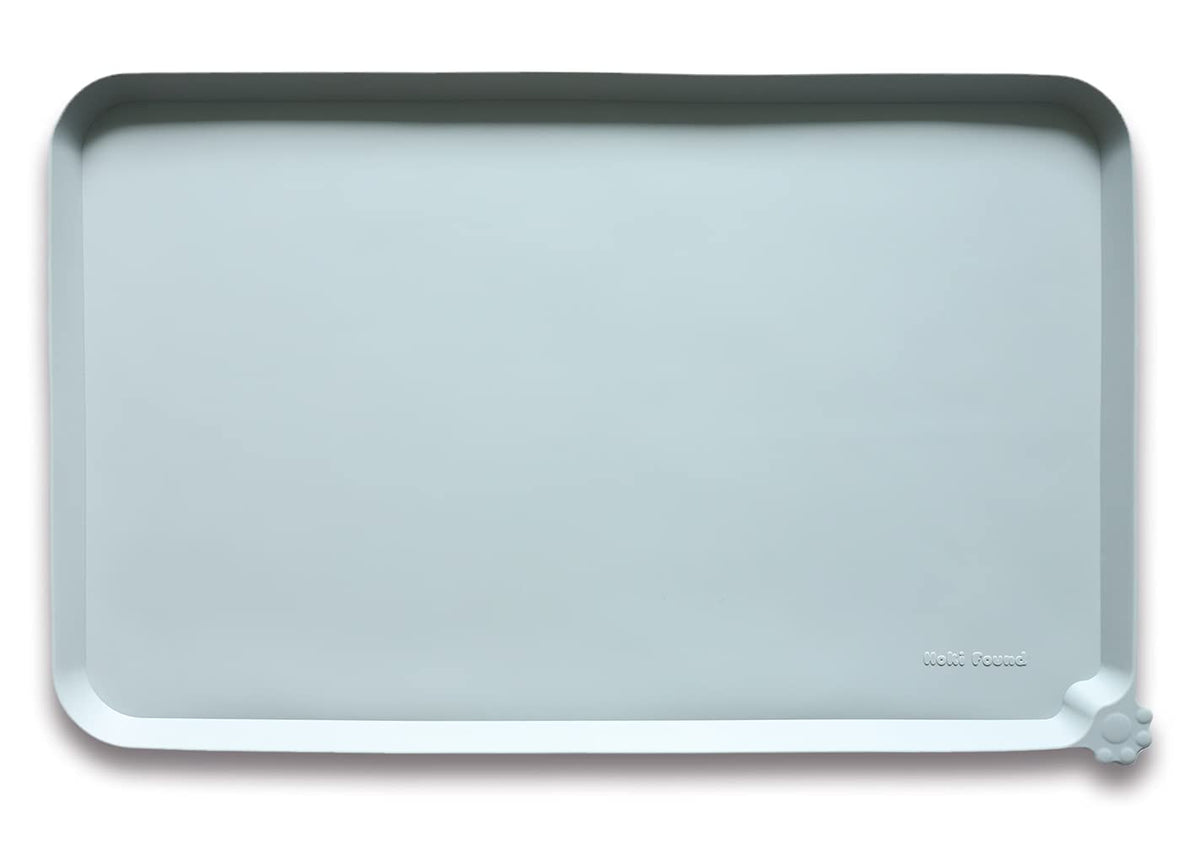 Hoki Found battleship large silicone pet food mat with raised edge keeps spills on mat.